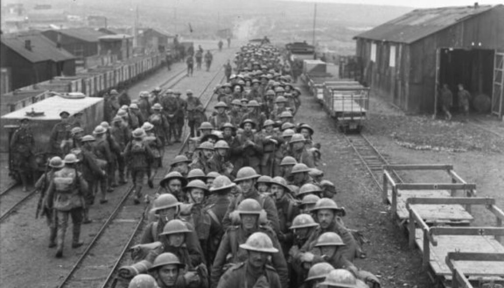 60_Canadian troops on Light Railroad trucks returning from Divisional Baths. September, 1917.